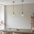 Travi Vintage Brass with Travertine Stone with Clear Shade Pendant Light