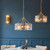 Keller 4 Light Brushed Aged Brass with Clear Panels Shade Pendant Light