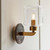 Travi Vintage Brass with Brown Marble with Clear Shade Wall Light