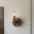 Travi Vintage Brass with Brown Marble with Clear Shade Wall Light