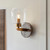 Travi Vintage Brass with Brown Marble with Clear Shade Wall Light