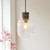 Travi Vintage Brass with Brown Marble with Ribbed Clear Shade Pendant Light
