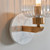 Travi Vintage Brass with White Marble with Ribbed Clear Shade Wall Light