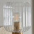 Travi Vintage Brass with Travertine Stone with Ribbed Clear Shade Wall Light