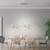 Leuchten Direkt Curls 4 Light Matt Brass LED Bar Pendant Light 