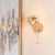 Ede Satin Gold with Ribbed Amber Glass Wall Light