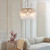 Karine 5 Light Brushed Aged Brass with Clear Shade Pendant Light
