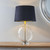 Endon Lighting Gideon Antique Brass with Clear Glass and Black Faux Suede Table Lamp
