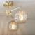 Endon Lighting Dimple 3 Light Brushed Brass with Champagne Glass Semi-Flush Ceiling Light