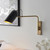 Endon Lighting Navren Swing Antique Brass with Matt Black Adjustable Wall Light