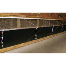 L.B. White tunnel doors installed at an evaporative cooling opening — representative black-interior system; size and colour may differ