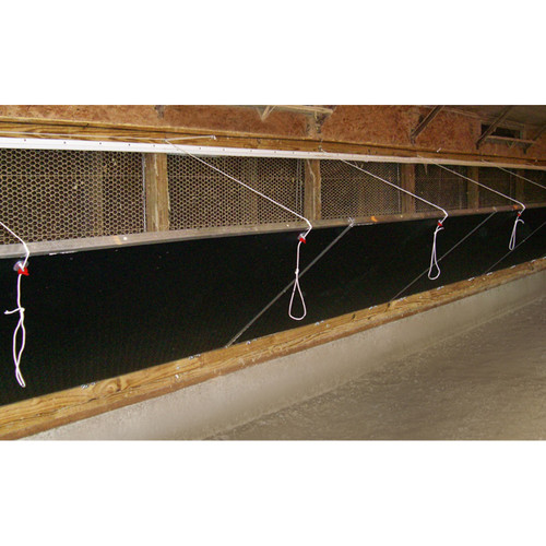L.B. White tunnel doors installed at an evaporative cooling opening — representative black-interior system; size and colour may differ