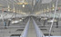 L.B. White I-Series radiant brooders suspended above swine pens; representative I-17 installation