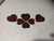 Large, Medium and Small Heart shaped Bookmarks made from chrome tanned leather and polyester waxed thread.