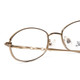 Close Up View of Joan Collins JC9810-GLD Designer Reading Eye Glasses with Custom Cut Powered Lenses in Gold Ladies Oval Full Rim Titanium 51 mm