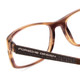 Close Up View of Porsche P8243-B Unisex Oval Designer Reading Glasses Striped Crystal Brown 54 mm
