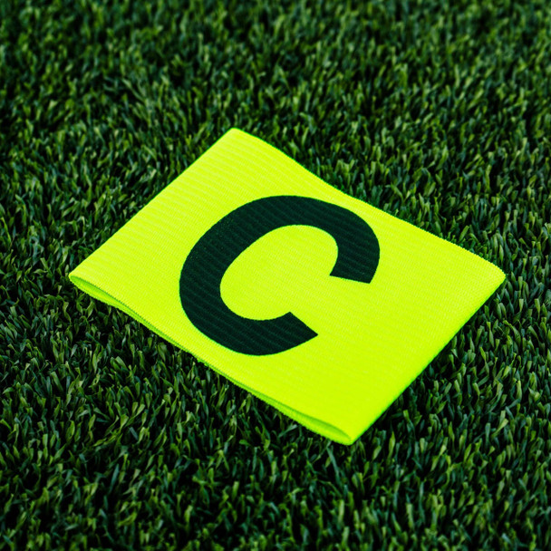 Neon Captains band visible on the field