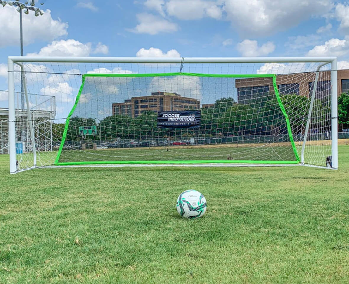 University soccer match with ball hitting durable soccer net
