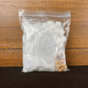 bag with cotton balls gloves and corn seeds