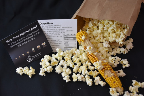 Popped popcorn with the dried popcorn cob and the instructions.