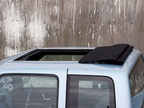 35" x 45" Two Fold Sliding Rag Top - displayed open on a vehicle