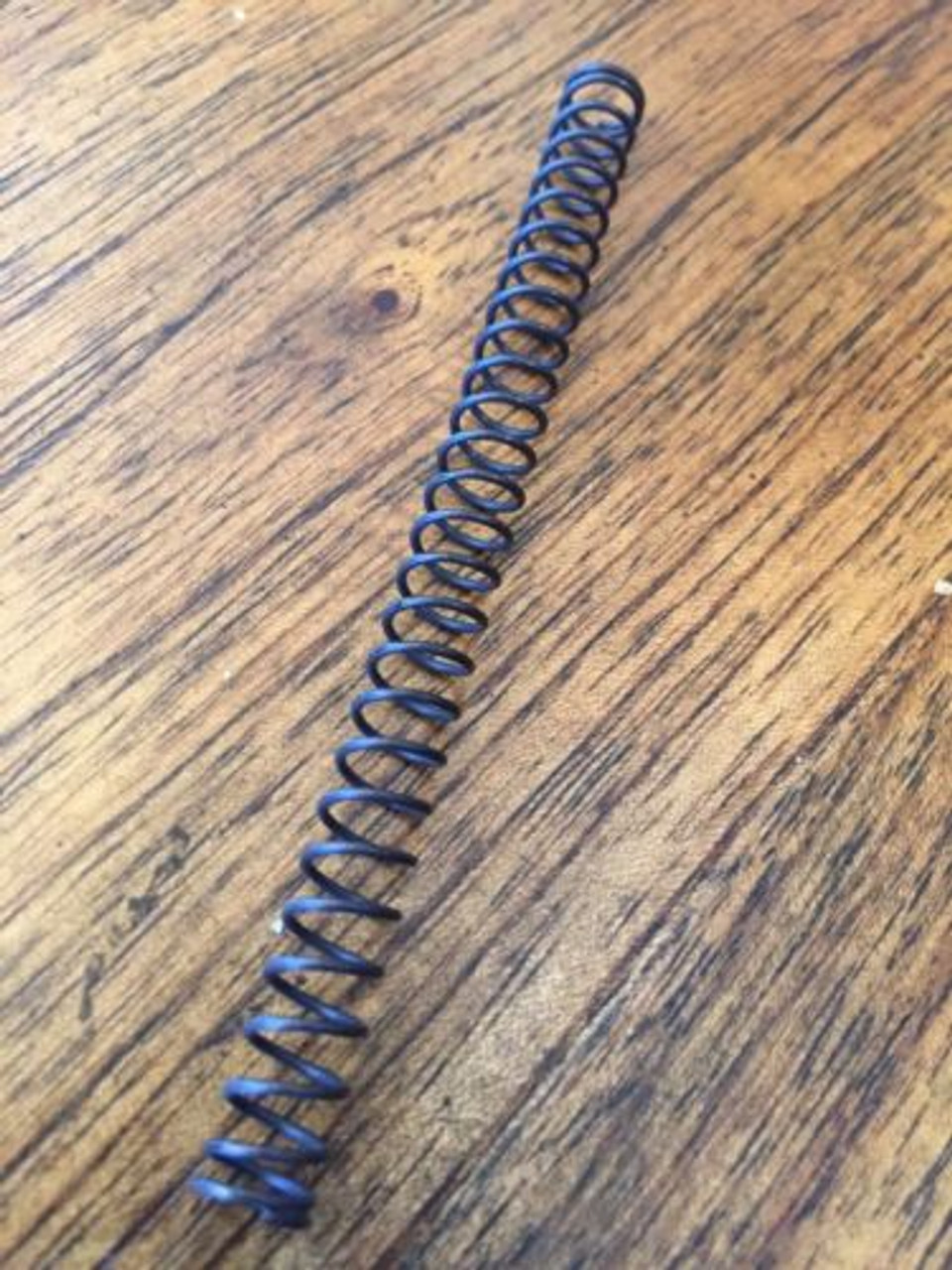 R26-27 NOS CARB SLIDE SPRING - 13110039167