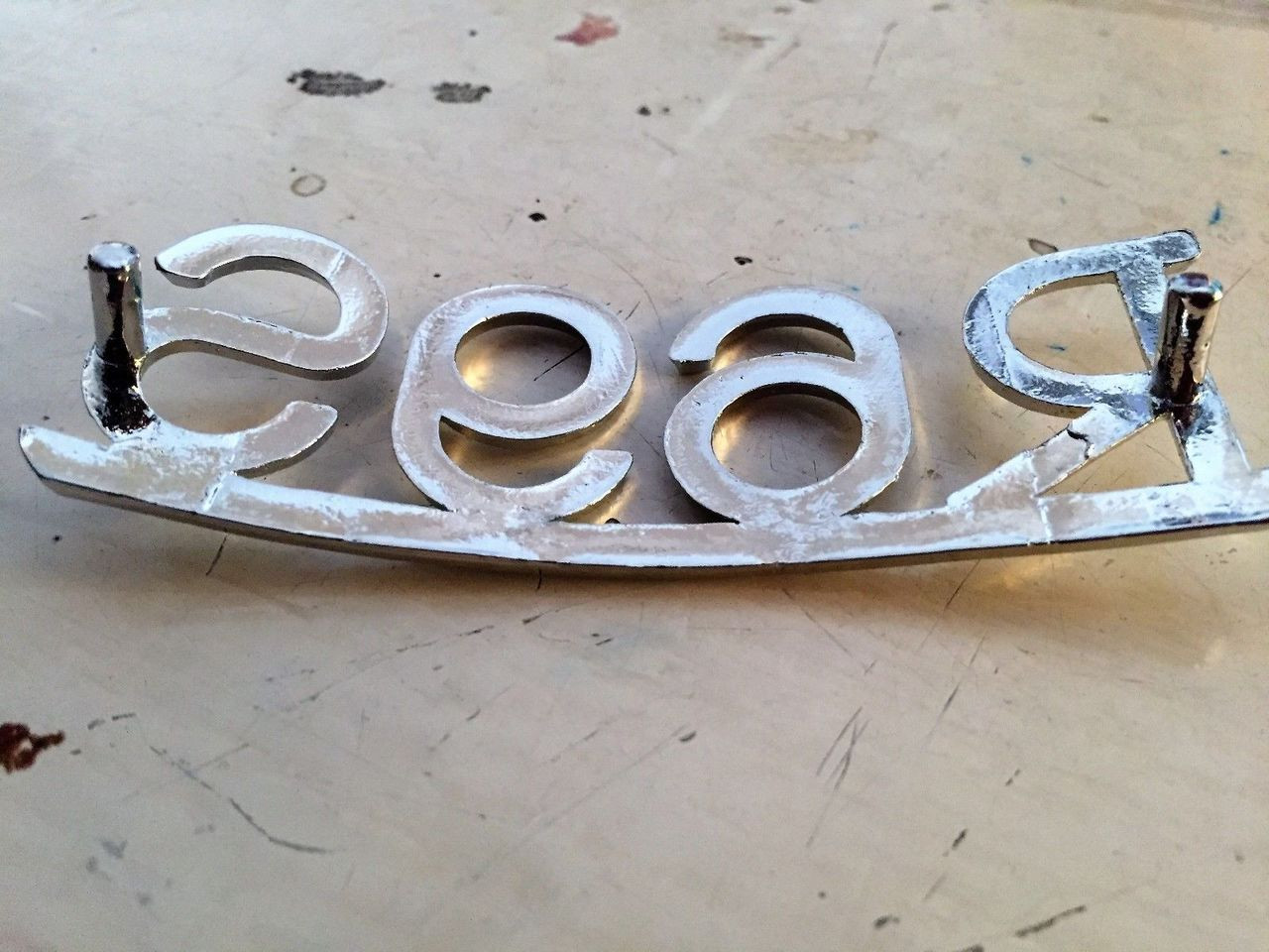 CHROMED REAR FENDER EMBLEM BEVELED EDGES AND CURVED NICE