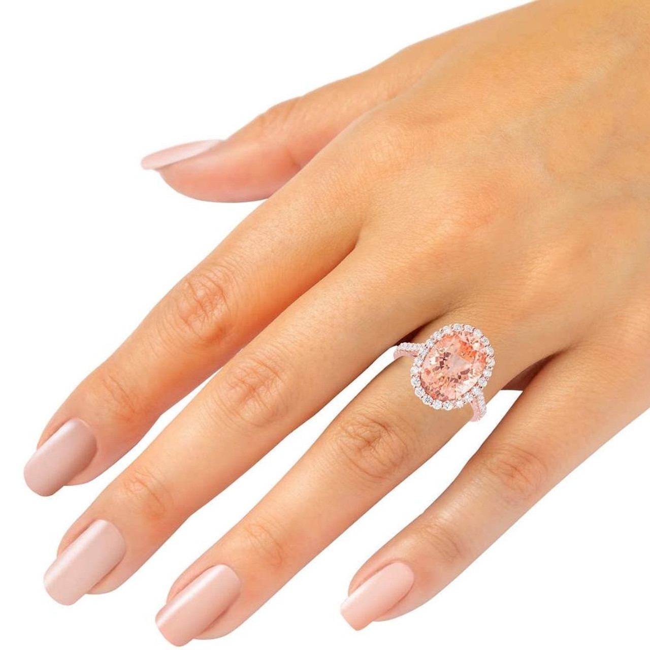 5 Ct Pink Topaz & Diamond Halo Ring in 10k Rose Gold (G-H, VS) 5 Ct Pink Topaz & Diamond Halo Ring in 10k Rose Gold (G-H, VS)