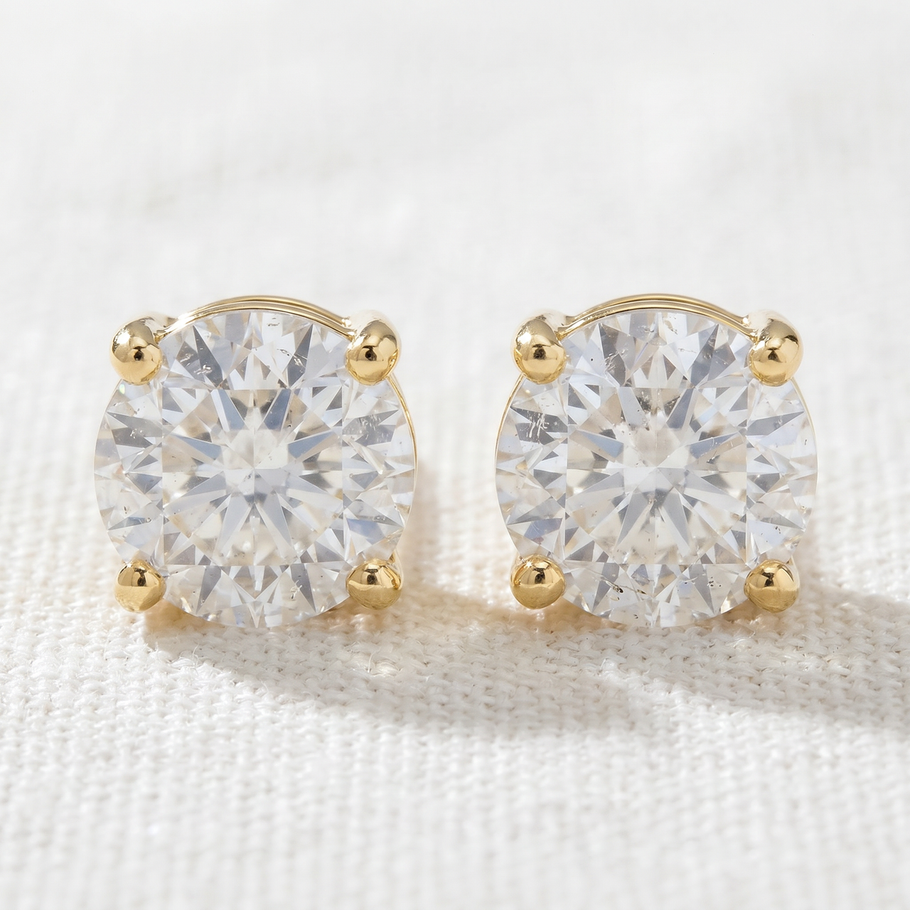 1 1/4Ct Round Brilliant Cut Natural Diamond Studs in 14K Gold Basket Setting (J-K, I2-I3)