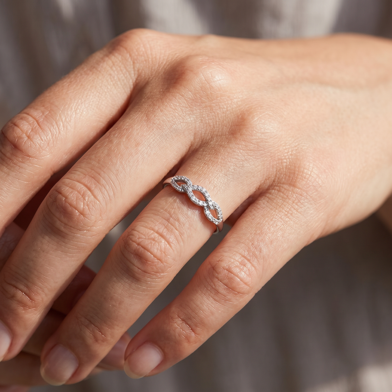 1/10ct Petite Diamond Infinity Ring 10K White Gold (G-H, I2-I3)