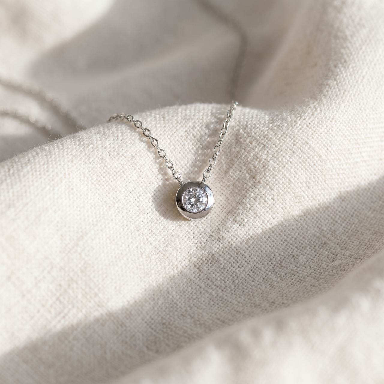 1/3ct Bezel Solitaire Pendant 14K White Gold (G-H, I1)
