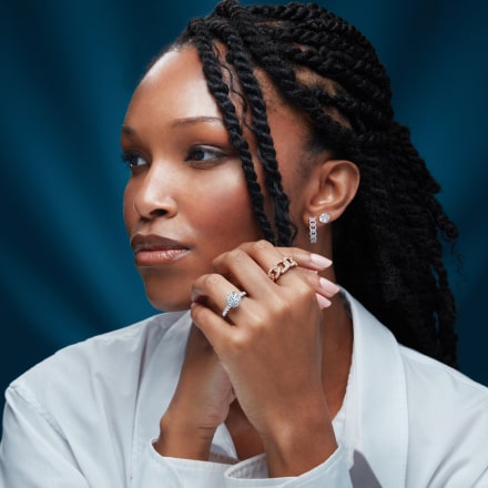 model wearing a variety of women's jewelry