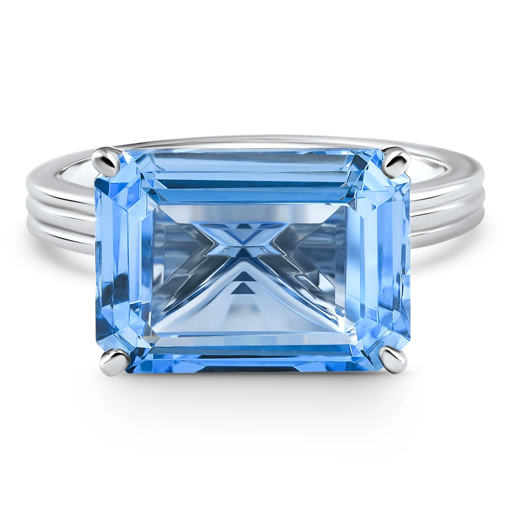 14x10mm Emerald Cut East to West Blue Topaz Solitaire Ring White Gold