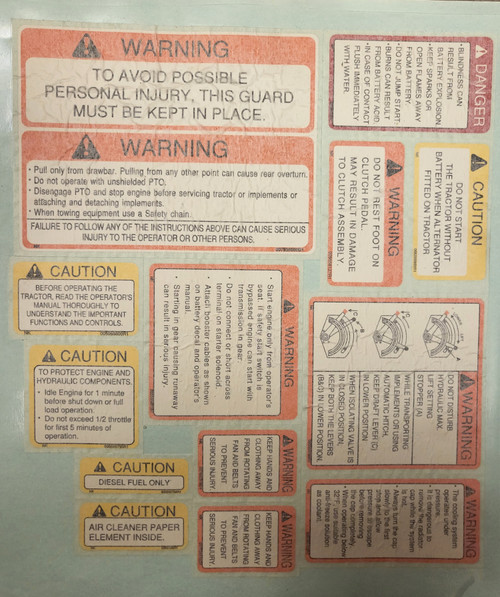 Mahindra 007535515C92 / 007535515C91 OEM safety and EPA sticker set showing multiple yellow, red and black warning and caution decals for 30 Series and 5500 Series tractors, used to replace missing factory hazard and certification labels on the hood, fenders and operator station .