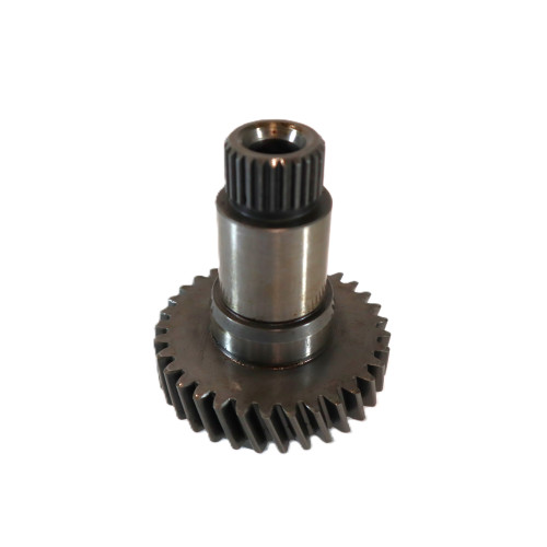 Close‑up of Mahindra hydraulic pump drive gear 006005061F1 showing a splined upper shaft and integral helical gear that installs in the engine front cover to drive the external gear‑type hydraulic pump on various Mahindra mid‑ and high‑horsepower tractors.