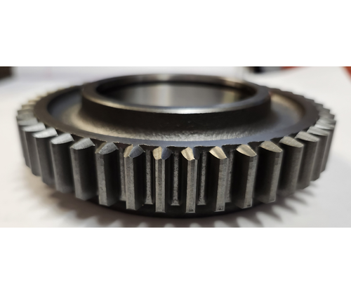 Mahindra 46‑tooth transmission gear 19451769000 used in the transmission (section 5) of 16 Series 3016 Gear/HST and 3616 Gear/HST 4WD and cab tractors and in the transmission gear trains on 1500/1600 Series 1526, 1533, 1538, 1626, 1635 and 1640 Gear and HST (OS, cab and Refresh) compact tractors. This internal constant‑mesh gear helps provide mid‑range drive ratios inside the gearbox, transferring power between main and counter shafts for forward speeds on Mahindra compact tractors.