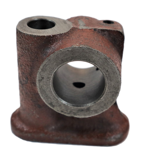 Mahindra valve lever shaft center bracket 000022010RD supporting the rocker arm shaft in the valve train on multiple 05 25 35 1500 1600 2500 2600 3500 3600 and 4500 Series tractor engines.