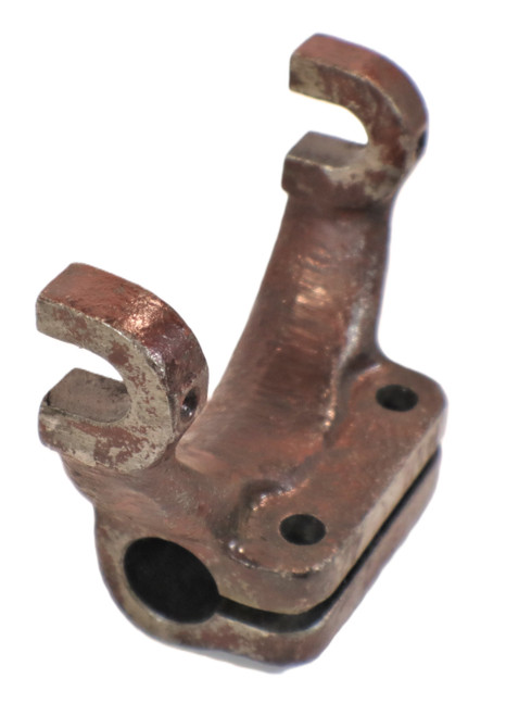 Mahindra clutch release bearing fork 001121813R1 (alternate 0000000ZF), OEM fork used on Mahindra 475 DI/E40 and 575 DI tractors to operate the clutch release bearing in the clutch housing.