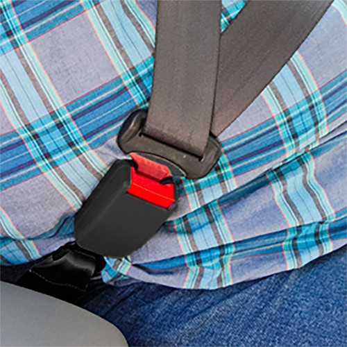 Black, regular Volvo Truck Seat Belt Extender buckled around a plus-sized passenger