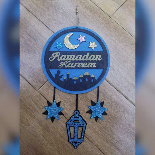 A beautiful blue and black hanging sign with the words "Ramadan Kareem" in an elegant design. Perfect for Ramadan festive decorations!