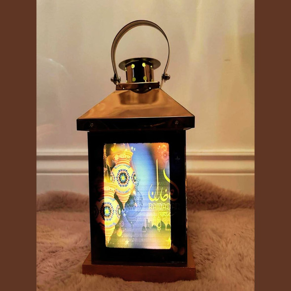 A stunning gold lantern. Experience the beauty of Ramadan with our Muslim LED Lantern Lamp!