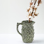 CPV3108OB - Aged Leafy Green Imprint Pitcher Vase - 8.2" H (8 pcs/case) CPV3108OB - Aged Leafy Green Imprint Pitcher Vase - 8.2" H (8 pcs/case)