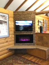 A Cozy Log Cabin Fireplace