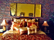 Stunning Bedroom Remodel with a Stacked Stone Wall Stunning Bedroom Remodel with a Stacked Stone Wall