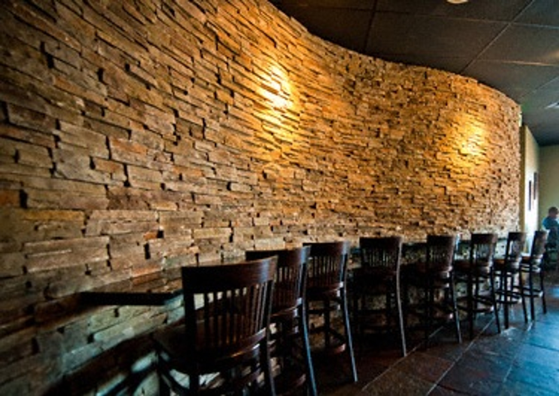 Curved Wall Design with Faux Stone Panels - Barron Designs
