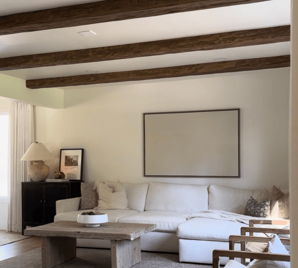 Timber faux wood ceiling beams in living room design