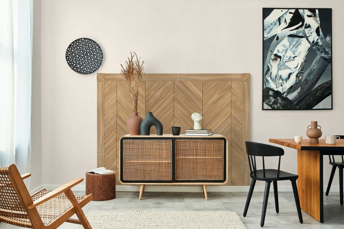 Chevron Faux Wood Wall Panels in Biscotti Java installed in a modern coastal style dining room