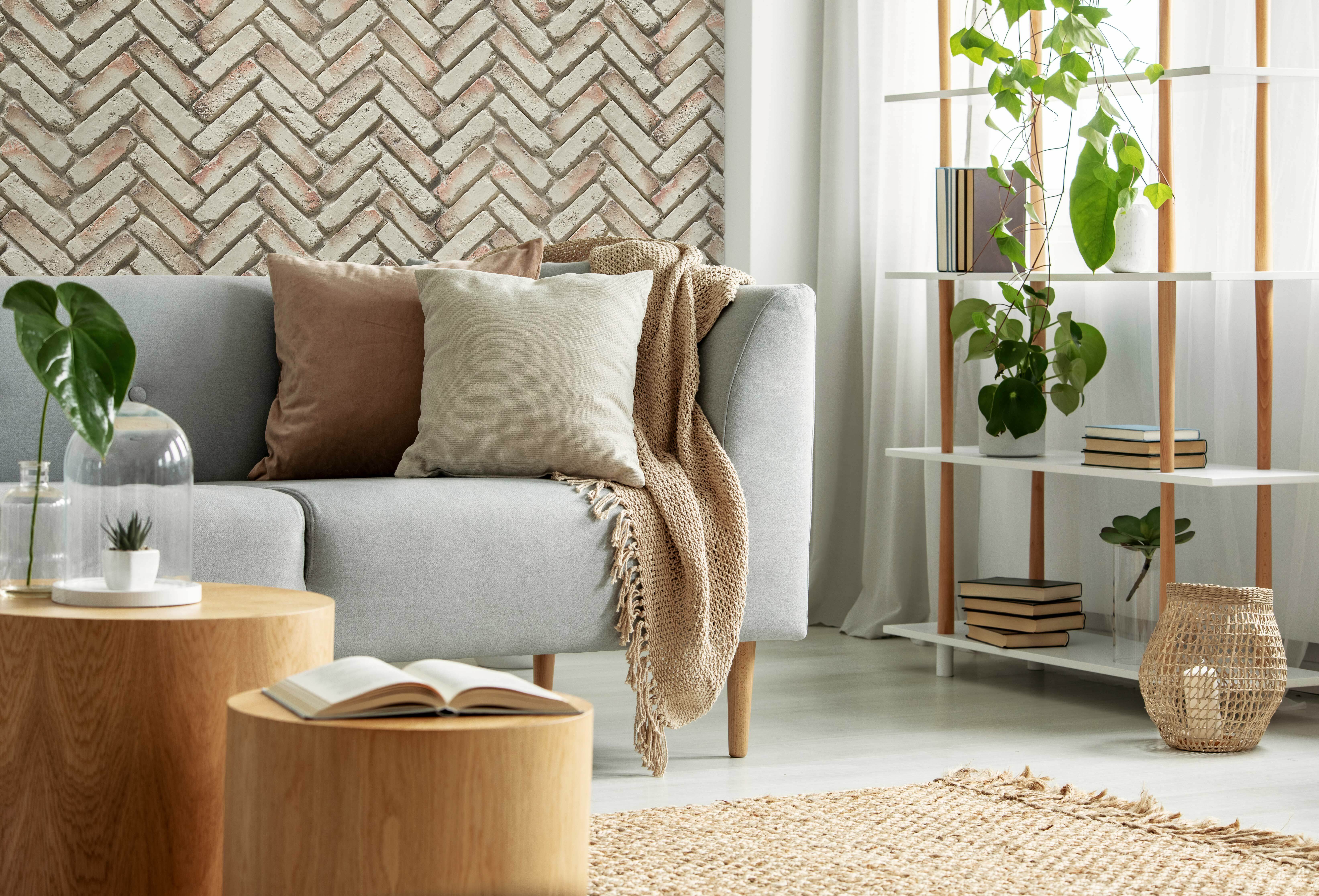 Bohemian inspired living room with faux brick wall panels 