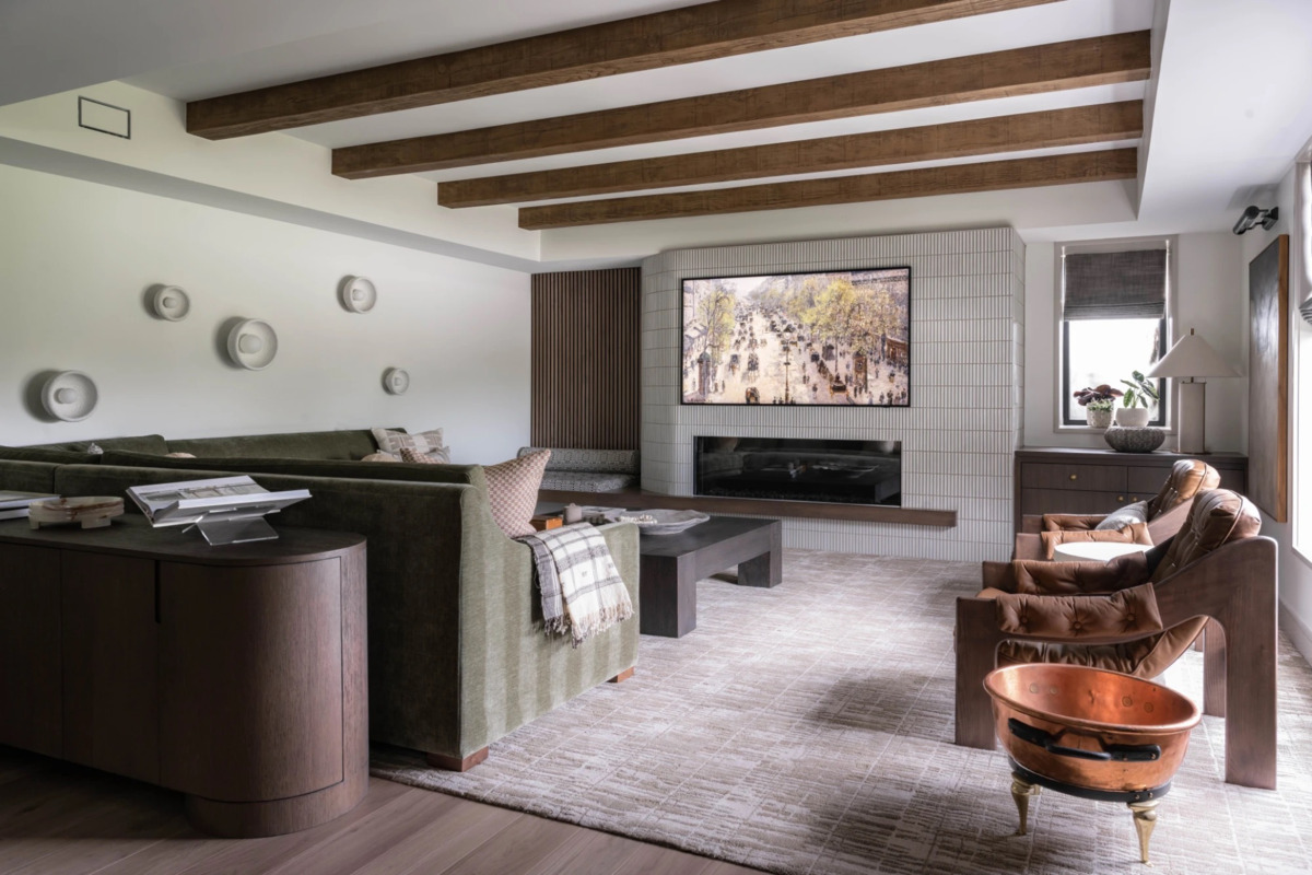 Rough Sawn Faux Wood Beams in Caramel installed on a modern living room ceiling.