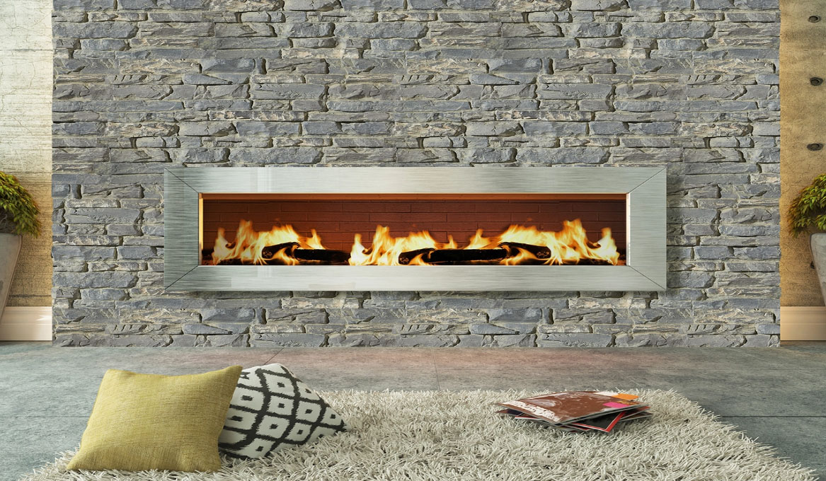 a stacked stone faux wall panel surrounding a gas fireplace